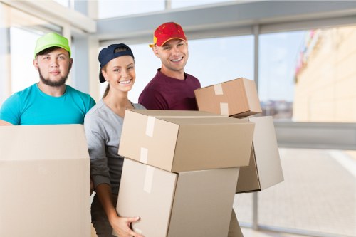 Movers Europe team transporting furniture